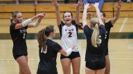 Check out photos from Ashwaubenon vs. De Pere girls volleyball