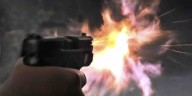 Stranger allegedly chucks propane tank through window, goes berserk inside home. But gun