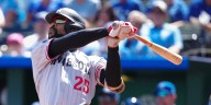 Byron Buxton exits after getting hit by pitch in knee