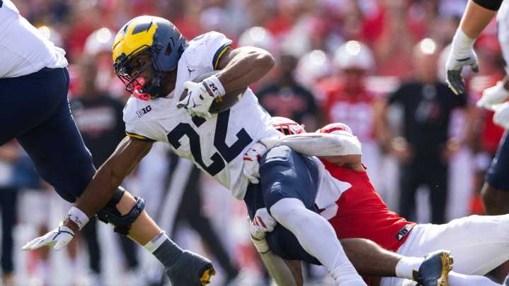 Haynes extends streak of 100-yard rushing games in Michigan victory