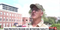 Man protesting McCook ICE detention facility in front of Governor’s Mansion