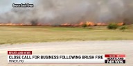 Close call for business following brush fire
