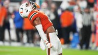 No. 4 Miami's defense holds Florida to 141 yards, Hurricanes ease past Gators 26