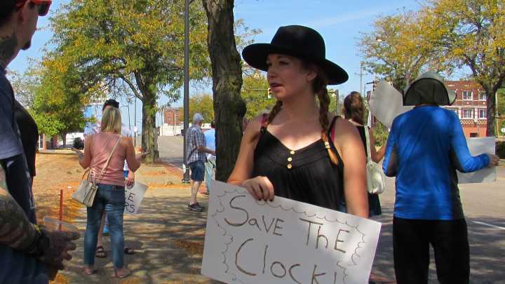 Protesters gather outside Firestone plant, call to preserve clocktower