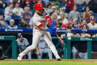 Phillies wrap up a 1st-round bye, hitting a team-record 8 homers to rout the Marlins