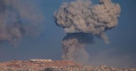 Strikes across Gaza kill at least 31 as international scholars accuse Israel of genocide