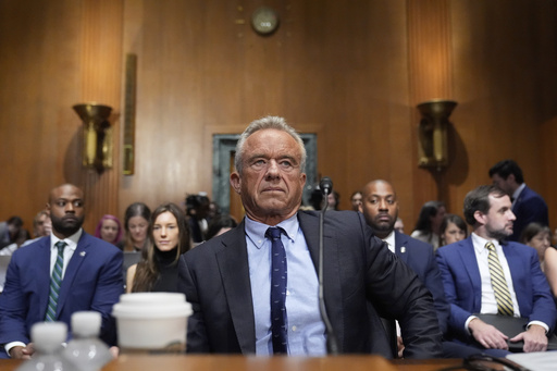 Kennedy tries to defend COVID-19 vaccine stance in raucous Senate hearing