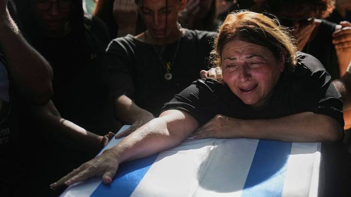 Strikes across Gaza kill at least 31 as international scholars accuse Israel of genocide