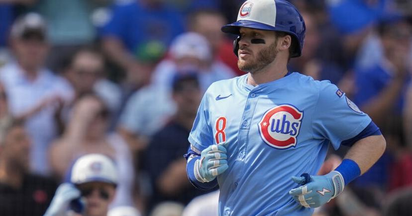 Happ homers as Cubs knock off Rays