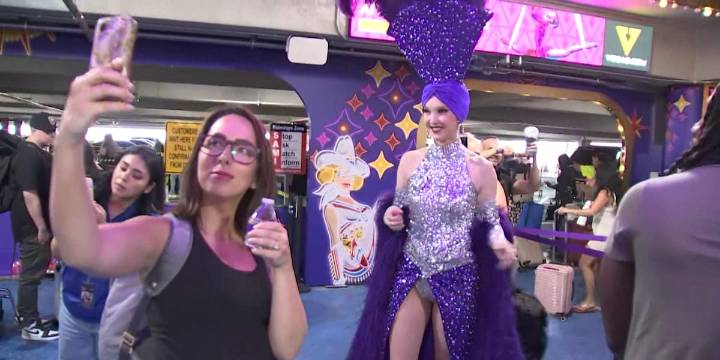 Disco balls and DJs: Las Vegas airport rideshare lot gets atmosphere glow