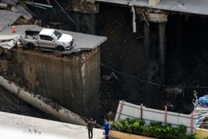 Massive sinkhole in Bangkok street forces evacuations