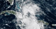 Storm watch issued for Florida coast as tropical depression nears