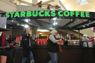 Starbucks to close hundreds of stores, lay off 900 workers as part of turnaround plan
