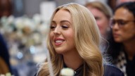 Tiffany Trump dazzles in off-the-shoulder royal blue gown as she supports Donald Trump
