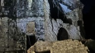 Strong earthquake in central Philippines damages building and sends people out of their homes
