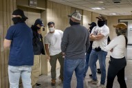 Trump administration rushes to rent space for immigration officers conducting raids