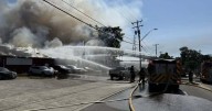 Firefighters battle burning commercial building in Painesville Township