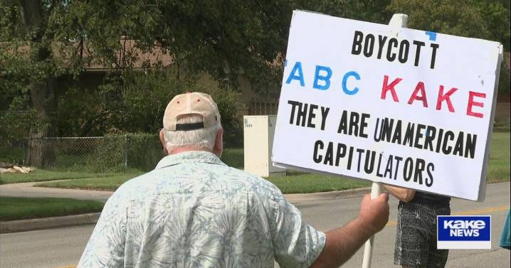 Protesters gather outside KAKE News Sunday over Jimmy Kimmel suspension