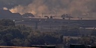 Train hits firetruck as crews fight fire at machine shop