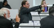 CDC vaccine panel adds new rules for getting the COVID vaccine in a tense meeting