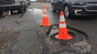 Michigan budget deal would steer $1.5B more to road, bridge repairs