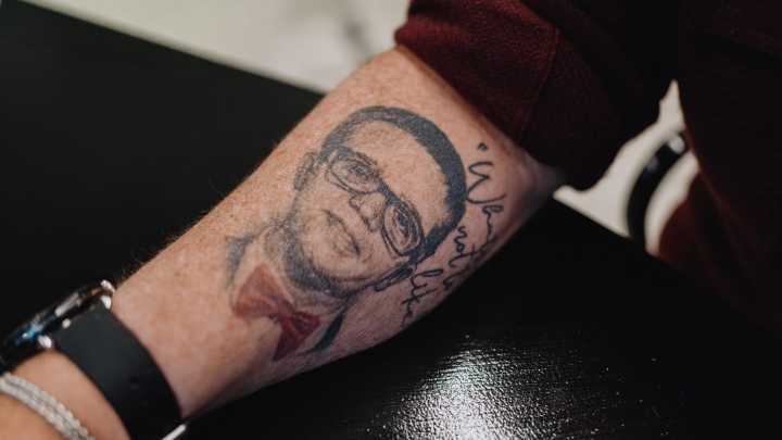 Dan Gilbert honors son with tattoo, Detroit research center
