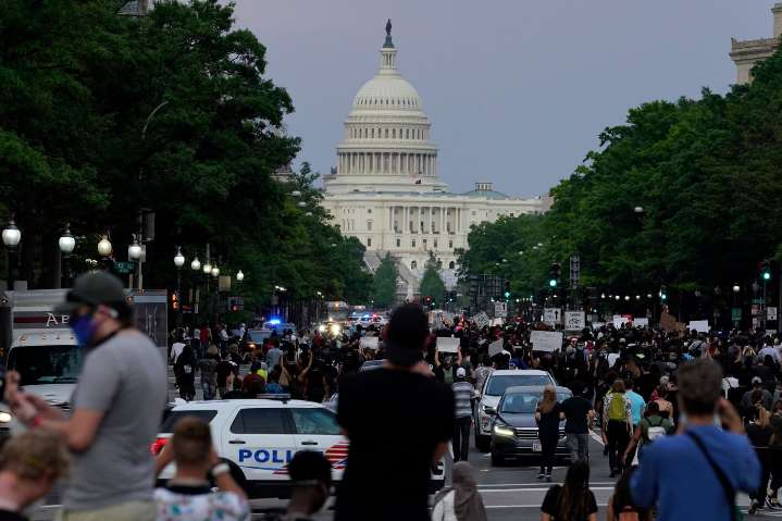 FBI fires agents photographed kneeling during 2020 racial justice protest, AP sources say