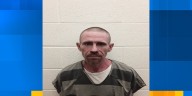 Monroe County man locks person in camper, sets it on fire, court records say