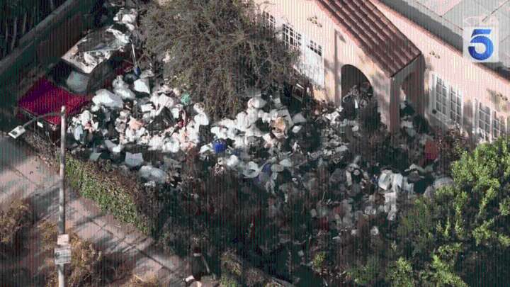 Rubbish piles return to infamous Southern California 'Trash House'