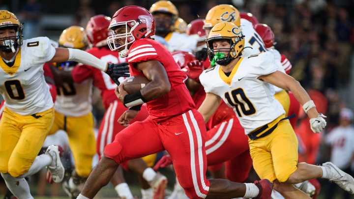Who are the top 10 Fayetteville-area high school football recruits?