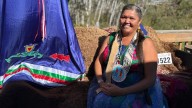 This residential school survivor is healing through powwow