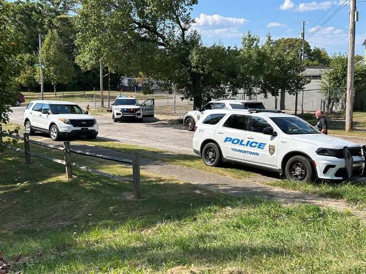 Youngstown officer uninjured after crashing into stop sign