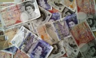 Palace uncertain what to do about cash hidden in Queen's mattress