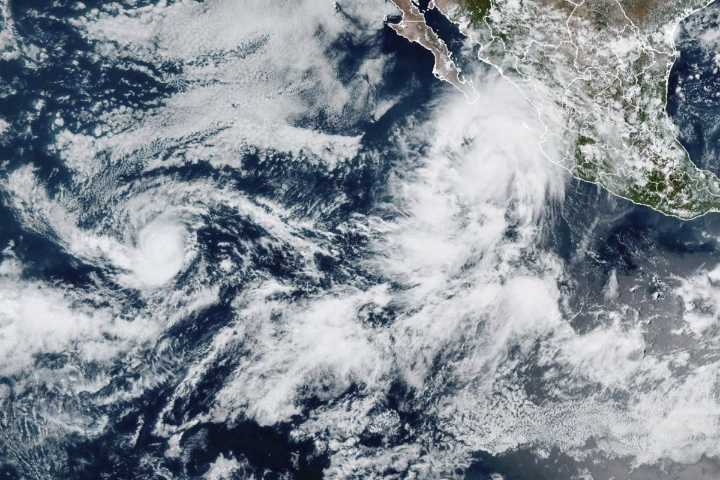 Lorena becomes a hurricane off the western coast of Mexico as Kiko travels over open waters