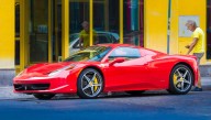 Benny Hinn Carefully Applies 'Not Of This World' Sticker To Ferrari 458 Italia