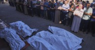 Strikes across Gaza kill at least 31 as international scholars accuse Israel of genocide