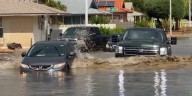 Final surge of monsoon moisture triggers flooding in Phoenix, outside of Las Vegas
