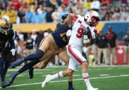 West Virginia can't contain Devon Dampier, loses big at home to Utah