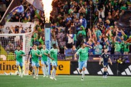 Sounders clinch playoff berth after battling Whitecaps to 2