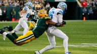 Micah Parsons has a successful debut with the Packers while dealing with a back issue