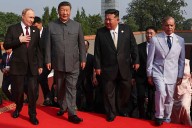 Putin meets North Korea's Kim in Beijing