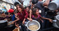 Denying famine, Israel threatens more curbs on Gaza aid