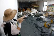 Taiwan rescuers battle thick mud to look for missing from Super Typhoon Ragasa