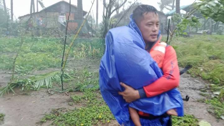 Super typhoon blowing by northern Philippines and Taiwan forces evacuations and closures