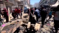 Al Jazeera reporter in aftermath of Israeli strike on crowded Gaza market