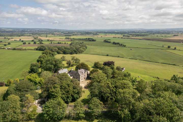 One of Yorkshire's great houses, burnt to the ground three generations ago, is back on its feet and on the market for the sixth time in a millennium
