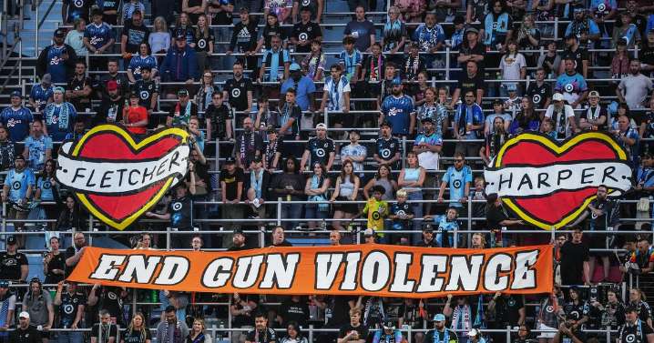 Banner held at MNUFC game reading "End Gun Violence" carries lineage to other school shootings