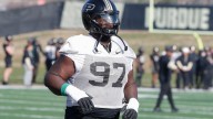 Purdue player had undiagnosed heart condition, is athletic after gaining wait to 345 pounds