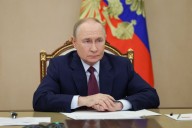 Putin says Russia is curbing economic growth to control inflation, recession ‘far away’