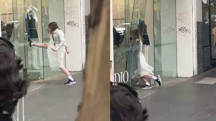 Shock footage captures brazen broad daylight theft as woman breaks through door of clothing store in front of stunned onlookers